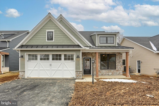 craftsman-style house with a garage and a porch