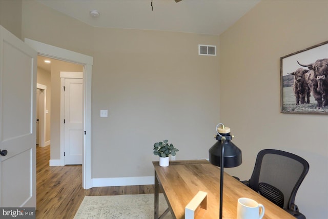 office featuring hardwood / wood-style floors