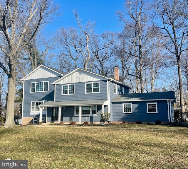 view of front of home featuring a porch and a front yard