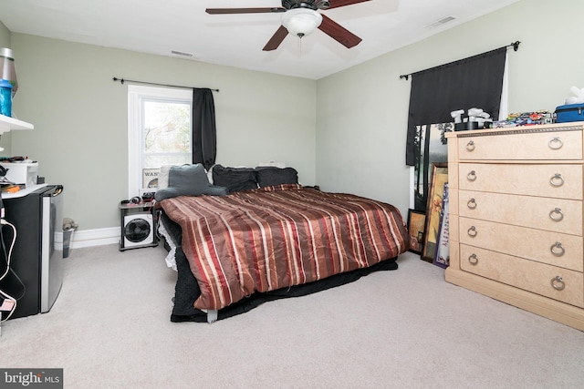 carpeted bedroom featuring ceiling fan