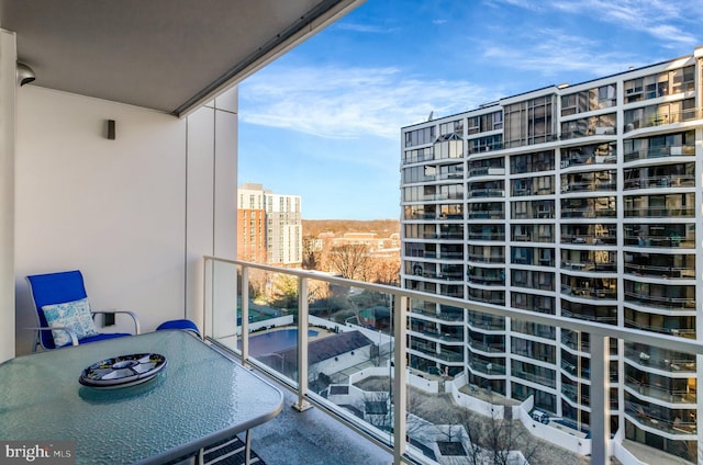 balcony featuring a city view