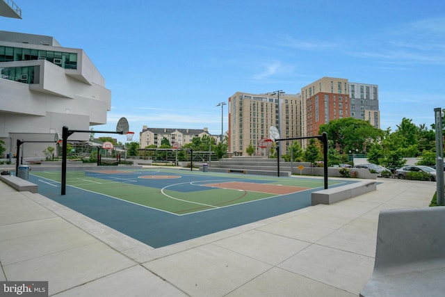 view of basketball court with a view of city and community basketball court