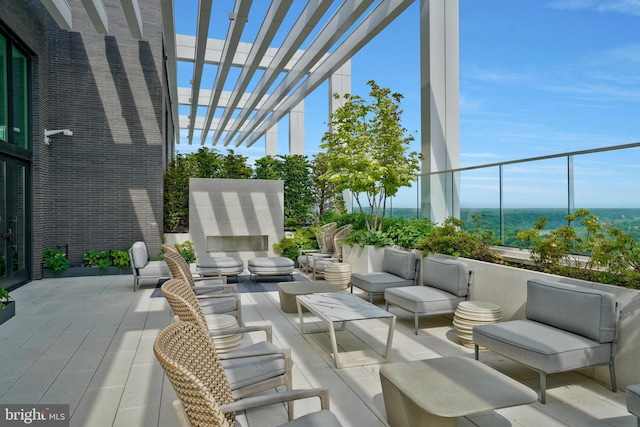 view of patio with outdoor lounge area and a pergola