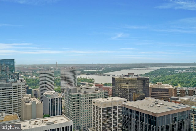 property's view of city featuring a water view