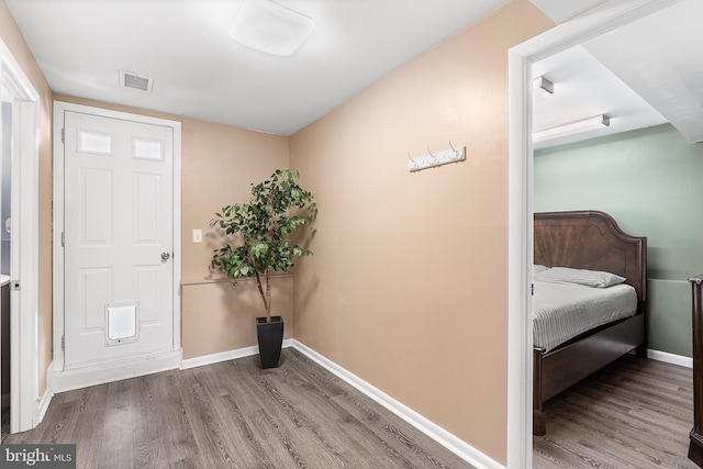 entrance foyer featuring hardwood / wood-style flooring