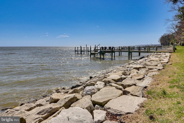 dock area featuring a water view