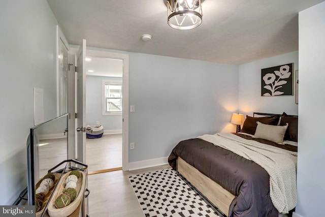 bedroom featuring light wood-type flooring