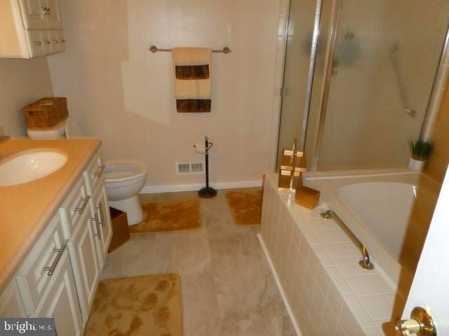 full bathroom featuring shower with separate bathtub, toilet, tile patterned flooring, and vanity