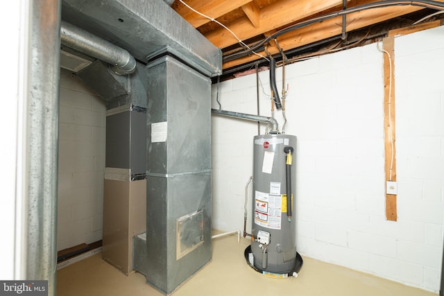 utility room featuring heating unit and water heater