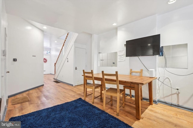 dining area with light hardwood / wood-style floors