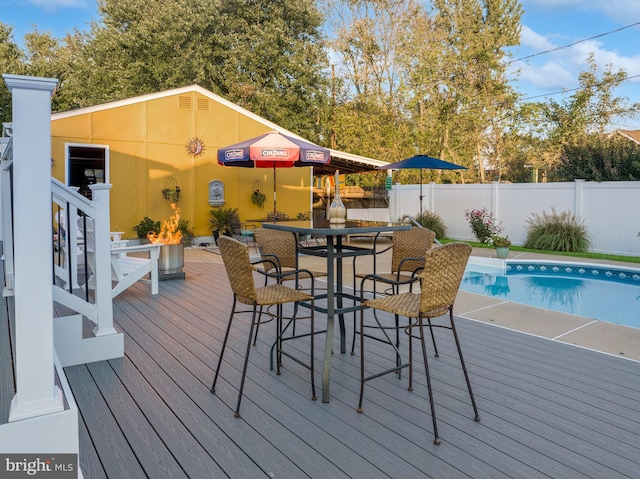204 E Marengo, Saint Michaels, MD 21663 - wooden deck featuring a fenced in pool and an outdoor bar
