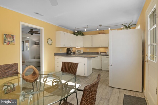 204 E Marengo, Saint Michaels, MD 21663 - kitchen with white cabinetry, white appliances, light hardwood / wood-style floors, and ceiling fan