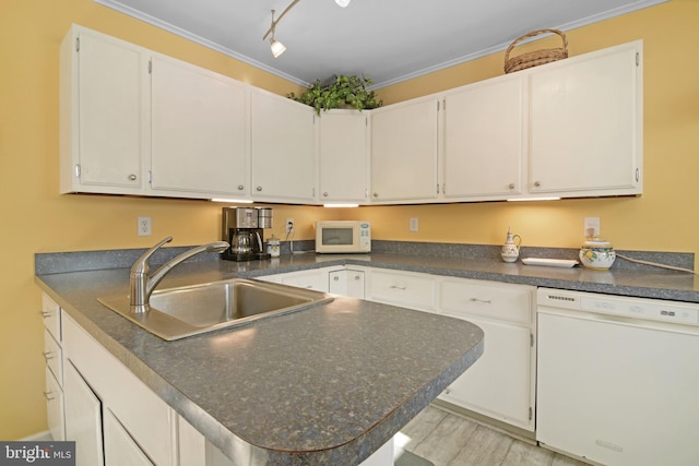 204 E Marengo, Saint Michaels, MD 21663 - kitchen with white cabinetry, white appliances, ornamental molding, and sink