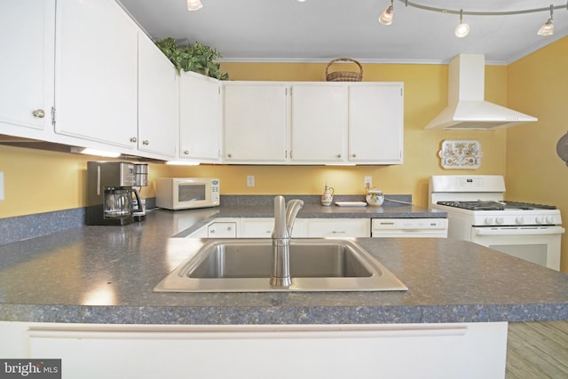 204 E Marengo, Saint Michaels, MD 21663 - kitchen with sink, white appliances, crown molding, white cabinetry, and exhaust hood