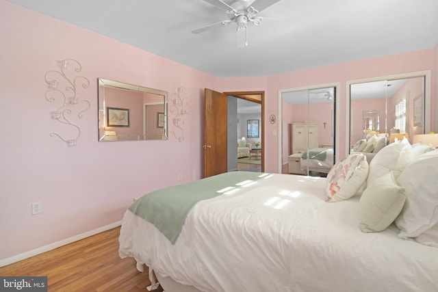 204 E Marengo, Saint Michaels, MD 21663 - bedroom featuring two closets, ceiling fan, and light hardwood / wood-style flooring