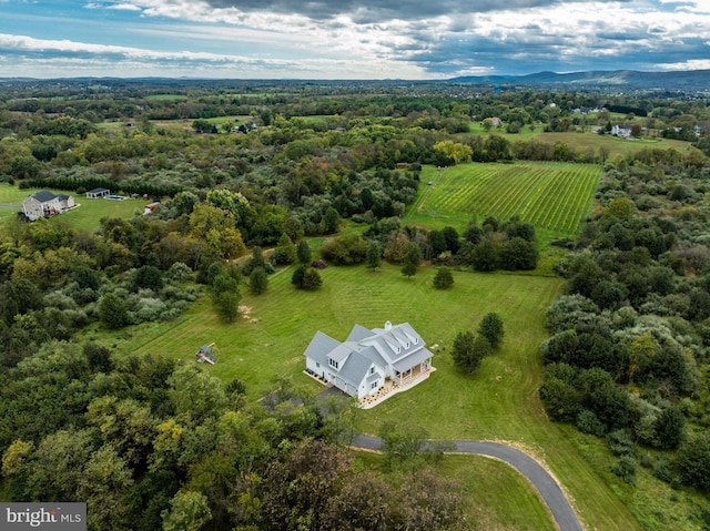 birds eye view of property featuring a rural view