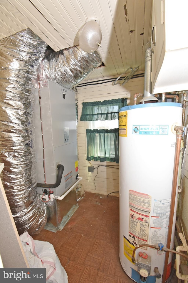 utility room with water heater