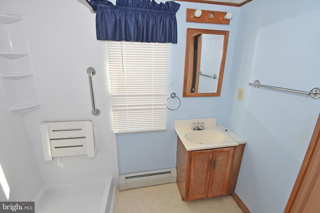 full bath with baseboard heating and vanity