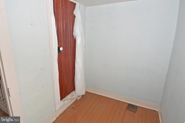 unfurnished room featuring light wood-style flooring