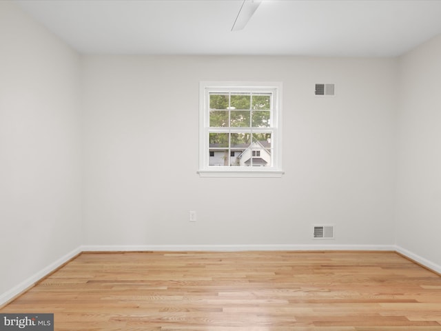9301 Reef Ct, Alexandria, VA 22309 - spare room featuring wood finished floors and baseboards