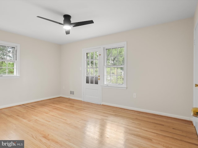 9301 Reef Ct, Alexandria, VA 22309 - empty room with a ceiling fan, light wood finished floors, and baseboards