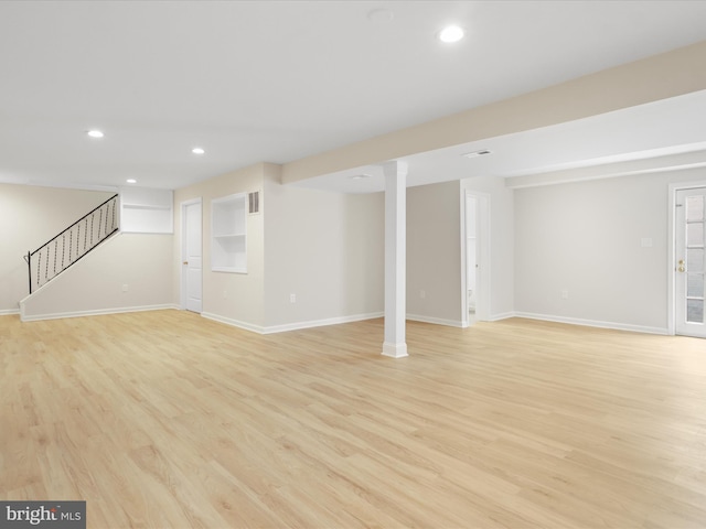 9301 Reef Ct, Alexandria, VA 22309 - finished basement featuring stairway, light wood-type flooring, recessed lighting, and baseboards
