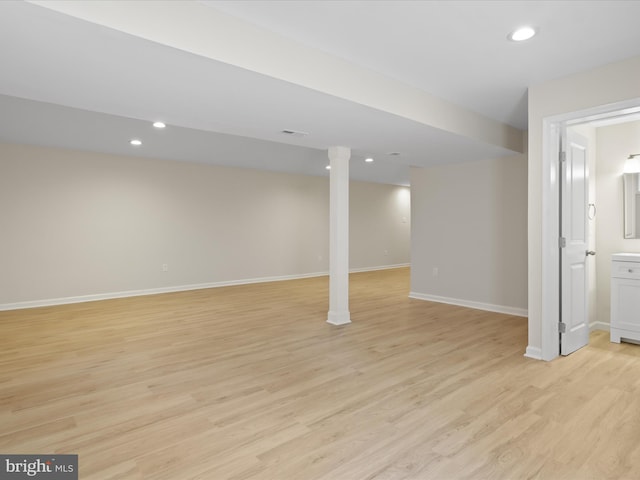 9301 Reef Ct, Alexandria, VA 22309 - finished below grade area featuring light wood finished floors, baseboards, and recessed lighting