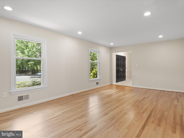 9301 Reef Ct, Alexandria, VA 22309 - empty room with light wood finished floors, baseboards, and recessed lighting