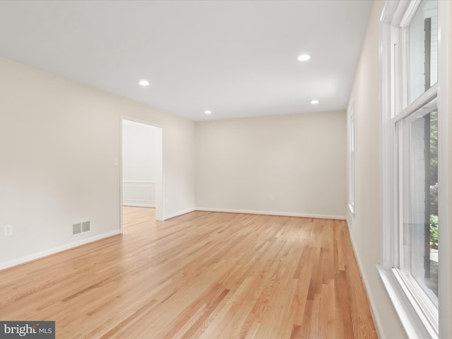 9301 Reef Ct, Alexandria, VA 22309 - unfurnished room with light wood-type flooring, recessed lighting, and baseboards