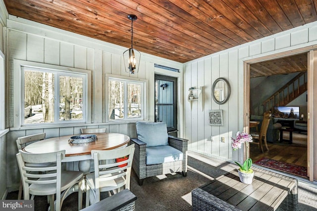 sunroom with wooden ceiling