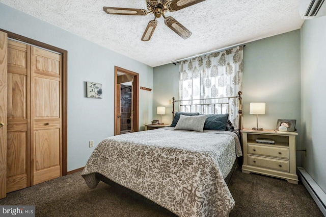 carpeted bedroom featuring a textured ceiling, baseboard heating, a closet, a wall unit AC, and ceiling fan