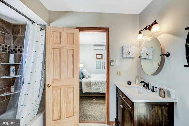 bathroom featuring shower / bathtub combination with curtain, vanity, and a wall unit AC