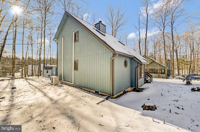 view of snow covered property