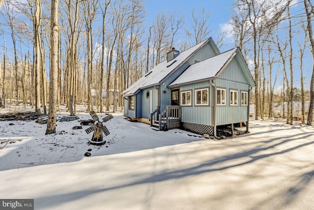 view of snow covered property