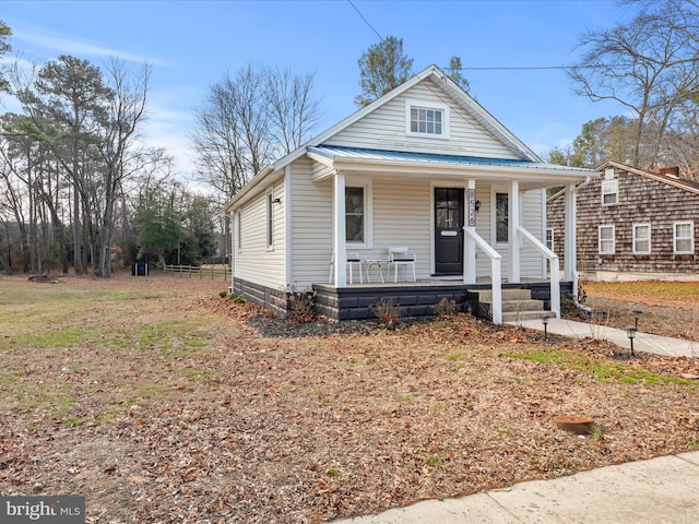 bungalow-style house featuring covered porch