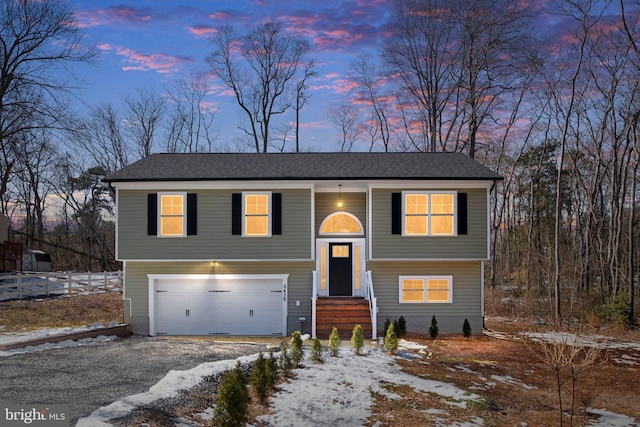 bi-level home with a garage