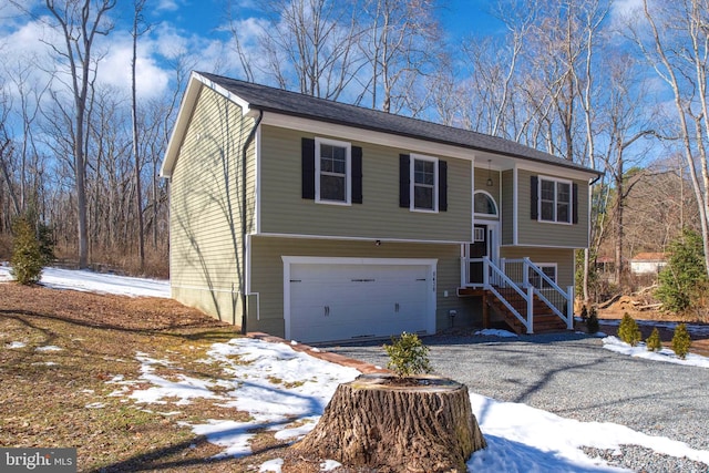 raised ranch featuring a garage