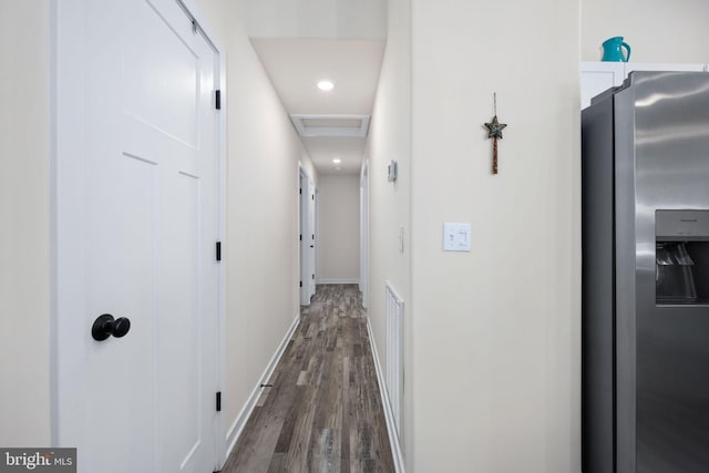 hallway featuring dark hardwood / wood-style floors