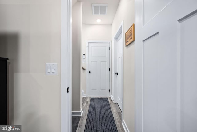 hall featuring dark hardwood / wood-style flooring