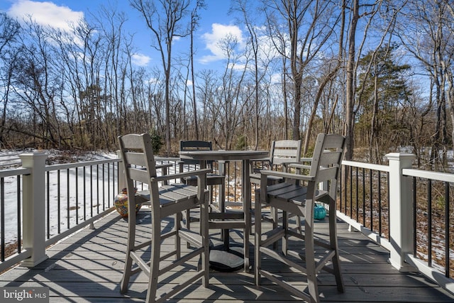 view of snow covered deck