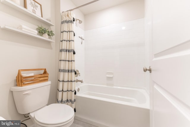 bathroom featuring toilet and shower / tub combo with curtain