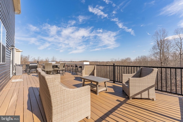 deck featuring outdoor dining space