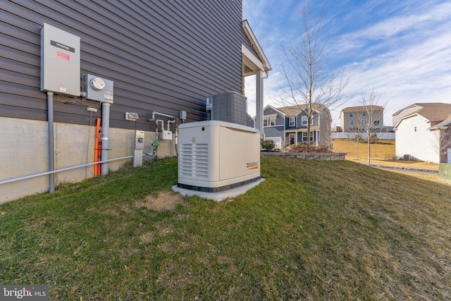 view of yard with central AC unit and a residential view