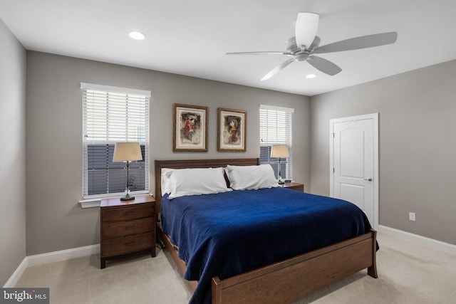 bedroom with light carpet, baseboards, a ceiling fan, and recessed lighting