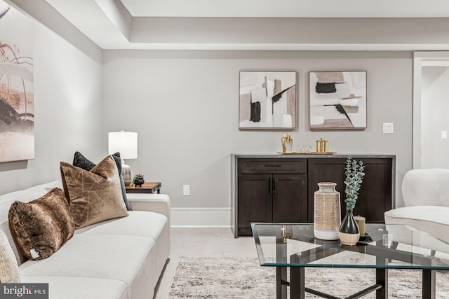 living area featuring light tile patterned flooring