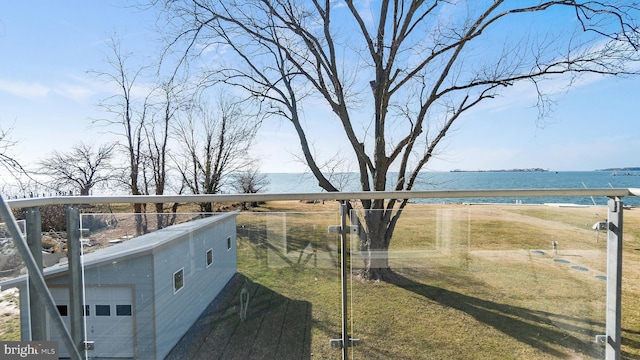 view of yard with a water view