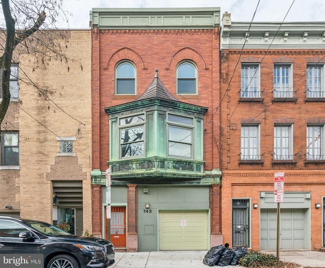 view of property featuring an attached garage