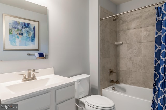 full bathroom with vanity, shower / bath combination with curtain, and toilet