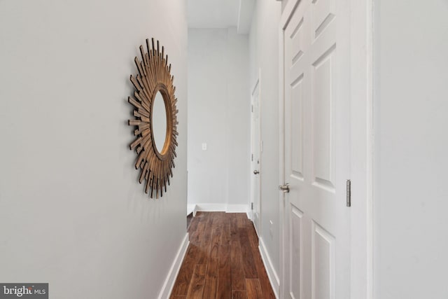 hall with dark hardwood / wood-style floors