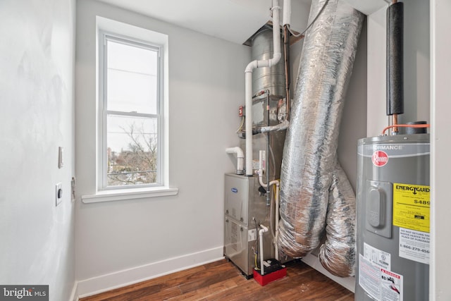 utility room featuring electric water heater